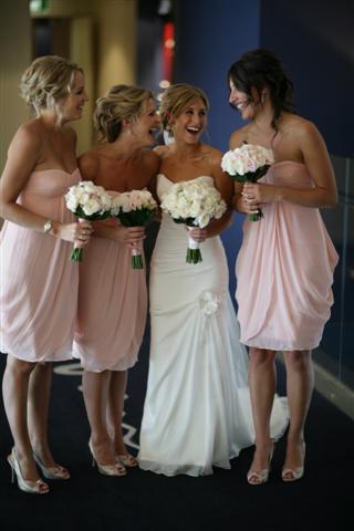 The bridesmaids wore pale pink frocks from Chic Collections