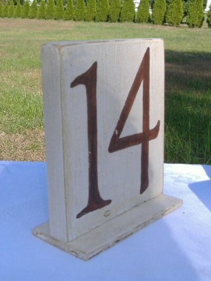 These wooden table numbers are perfect for a rustic or farm wedding 