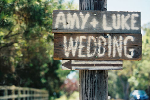 Amy and Luke made wooden signs to guide their guests to the ceremony held st