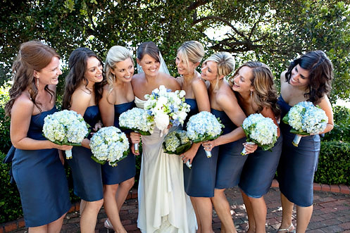  floral arrangements using blue and white hues with seashells