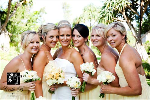 Cassie's bridesmaids wore custom made gowns in pale yellow