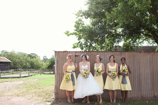 The bridesmaids wore Yellow dresses 1950's style with a full skirt and all