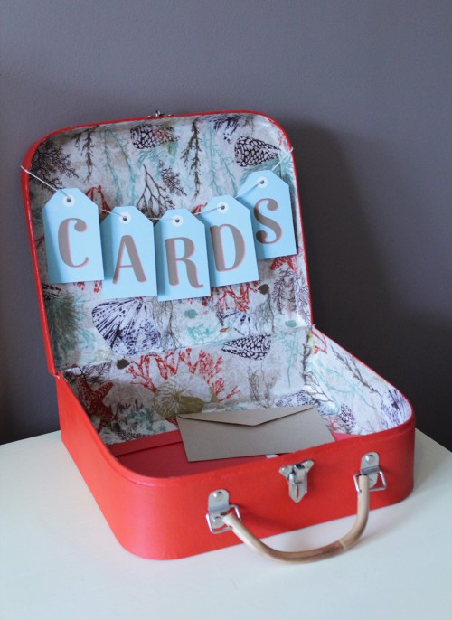 Add a touch of whimsy to your reception with this sweet suitcase card box