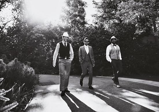 The groom wore a Jack London suit while his groomsmen wore vintage attire